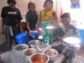Mama Akan has 4 kids, and sells food since 1991