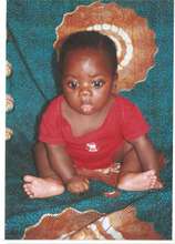 Small boy nourished with champimix porridge