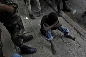 Danny, 12/yo street kid being interrogated by UN