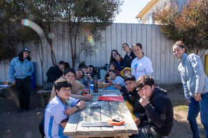 Group of teachers and students from the woodworkin