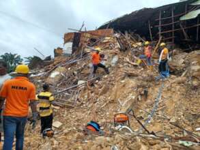 rescue team on collapse building site