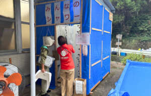 AAR Furukawa inspecting a temprary shower room