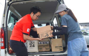 AAR staff loading supplies for a welfare facility