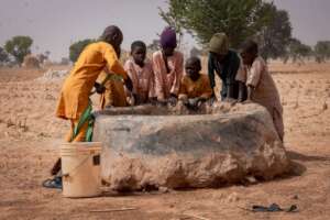 Children fetching water from unsafe wells