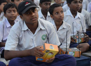 Students with their solar lamps