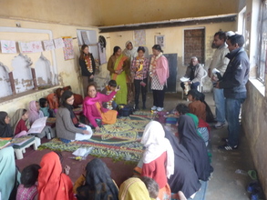 Interacting with the girls at the centre