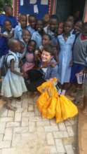 Infants welcomed us at their school.