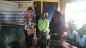 UYSTO director&Rebecca D/headteacher giving speech