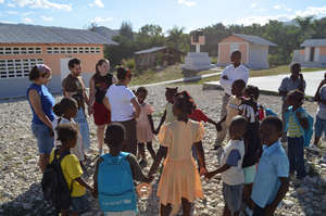 Some team members playing a Haitian game
