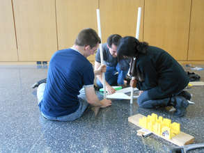 Alex Simon & Dhara assembling the charging station