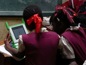 Two Girls Using Laptop