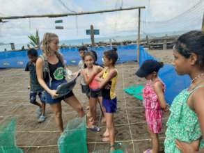 Ashleigh teaching kids about the nests