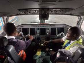Pilot teaching a student how to fly a airplane