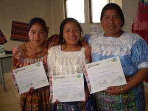 Girls receiving diplomas