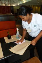 Marigel learning to clean tables @ the Restaurant