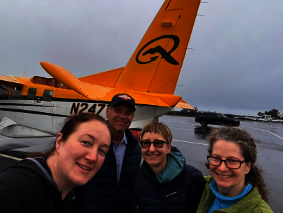 Mickaboo volunteers, pilot, and the plane