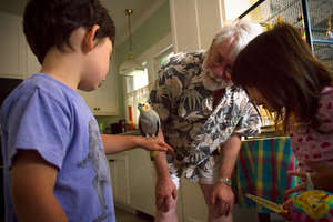 Grandpa teaches another generation about pet birds