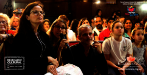 Three sign language interpreters at work