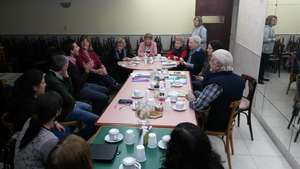 Deaf coordinator explaining