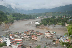 Floodwaters crashed through Nepal and Tibet
