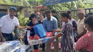 Peace Winds team distributes kitchen supplies