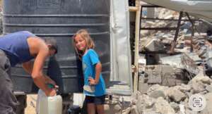 Girl Accessing Clean Water from LSR's well