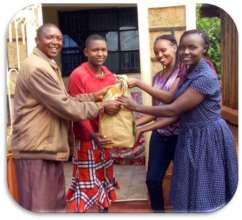 Patient D with dad and THAP staff