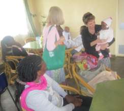 Team members interact with patients
