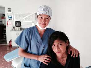 Adela at Burn Center giving Dental Treatment