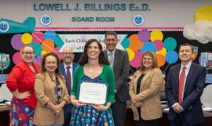 Melissa S. Shines as She Wins Her Award