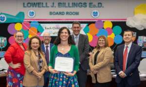 Melissa S. Shines as She Wins Her Award