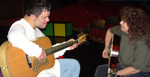Robin and Michael play guitar