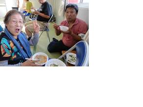 Ms. Sanjo, talks cheerfully with JEN Staff