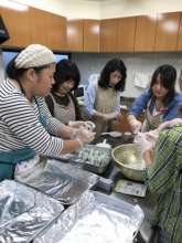 Preparing rice balls for BBQ