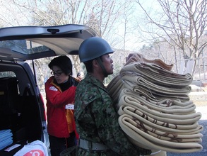 Japan Self Defense Force helps unload relief items