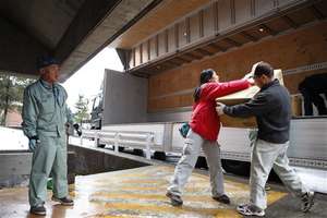 AAR JAPAN staff unloads relief items from Tokyo