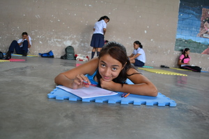 Laura writing on her journal