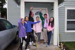 Families celebrate receiving their new home keys