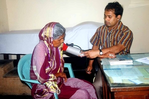 Doctor Examinig a Patient