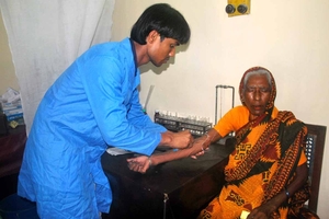 Paramedic Drawing Blood for Tests