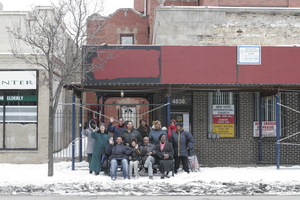 Women in front of the building we'll be renovating