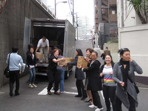 Volunteers loading the truck with relief supplies