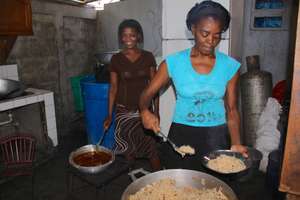 Kitchen workers preparing the day's meal