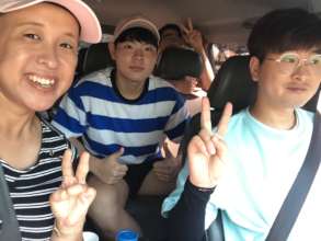 Minyeal driving to Aemangwon with other volunteers