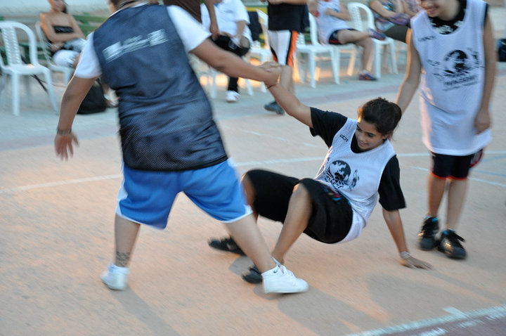 Use sport to unite children in divided communities