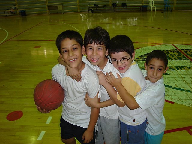 Use sport to unite children in divided communities