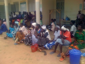 Clinic staff speaking to patients