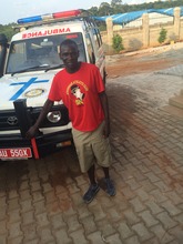 Julius Achon with new Ambulance