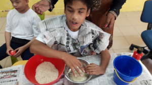 Daniel making raibow rice
