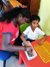 Raag doing his fine motor and cognitive exercise.